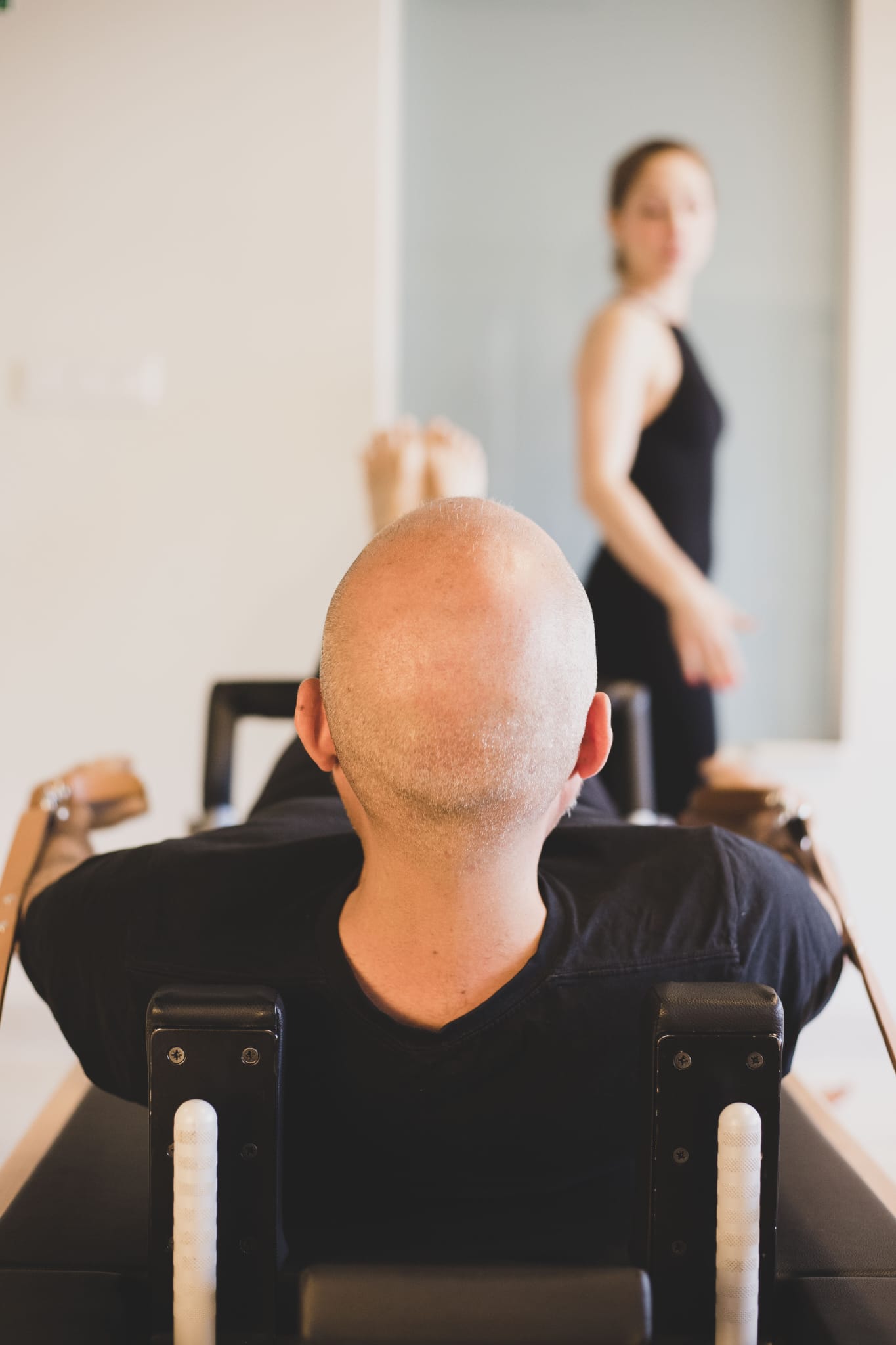 Minimalist pilates studio equipment detail
